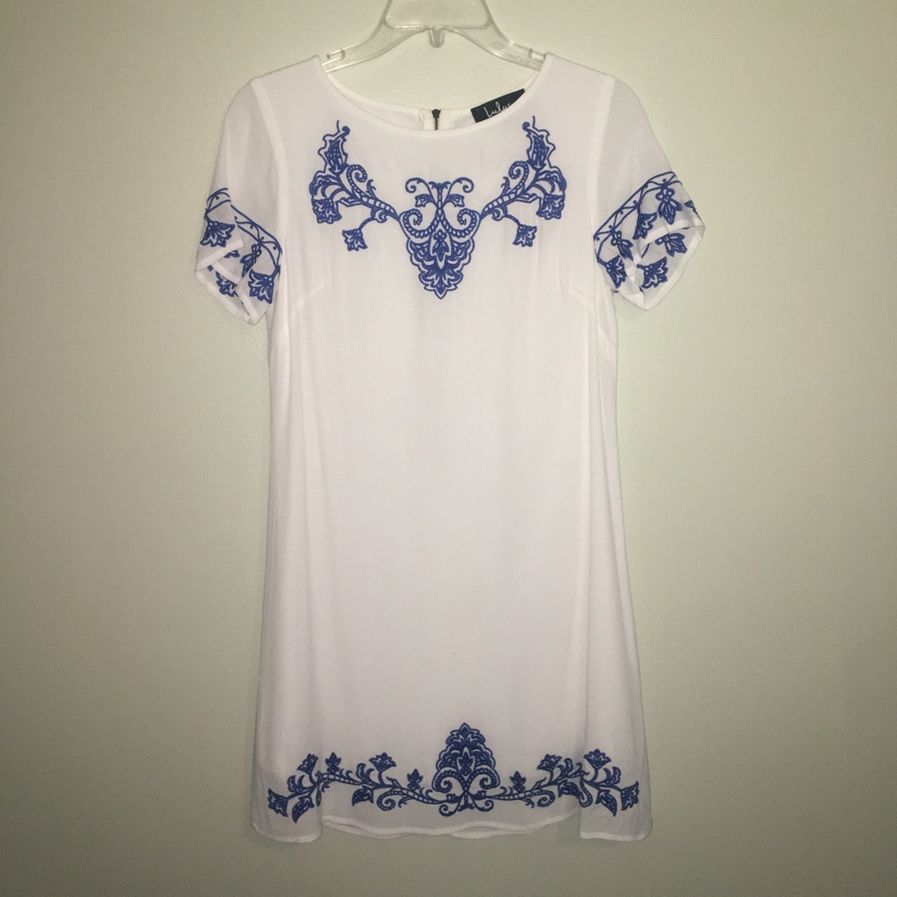 White dress with stitched blue detail